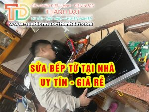 Thợ sửa chữa bếp từ tại nhà ở Hà Nội của công ty Thành Đạt